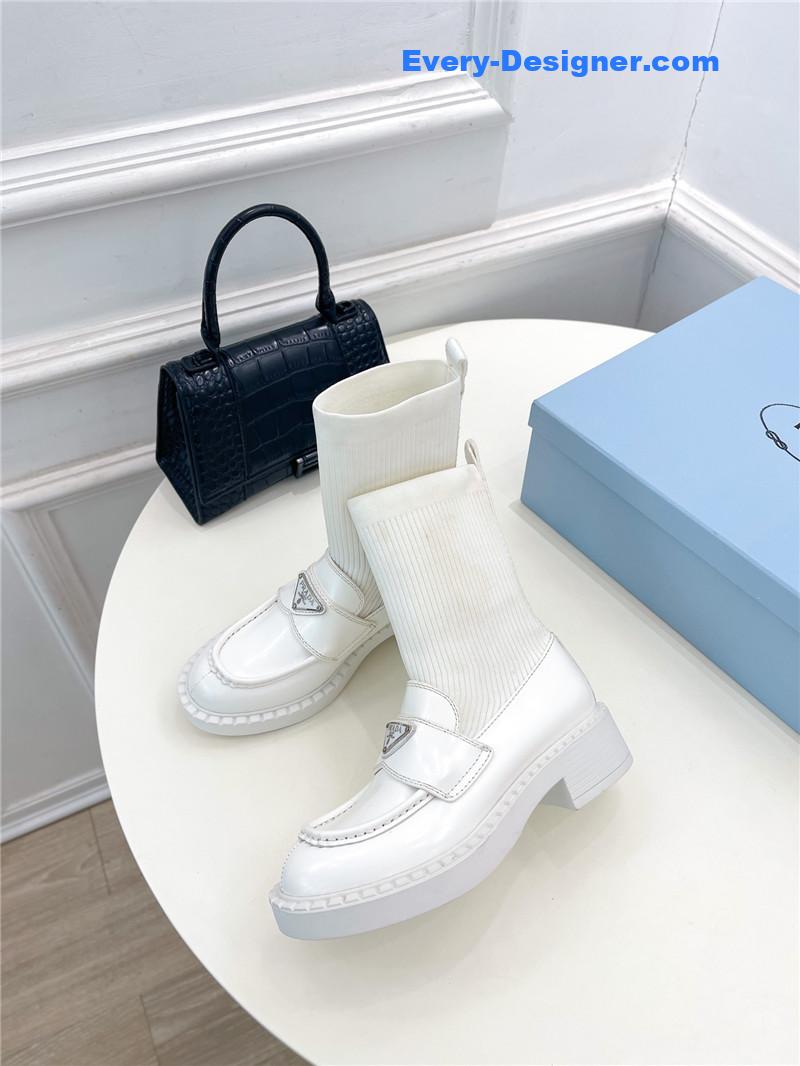 Pra*a catwalk style thick-soled triangle logo socks ankle boots