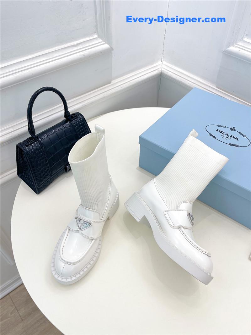 Pra*a catwalk style thick-soled triangle logo socks ankle boots