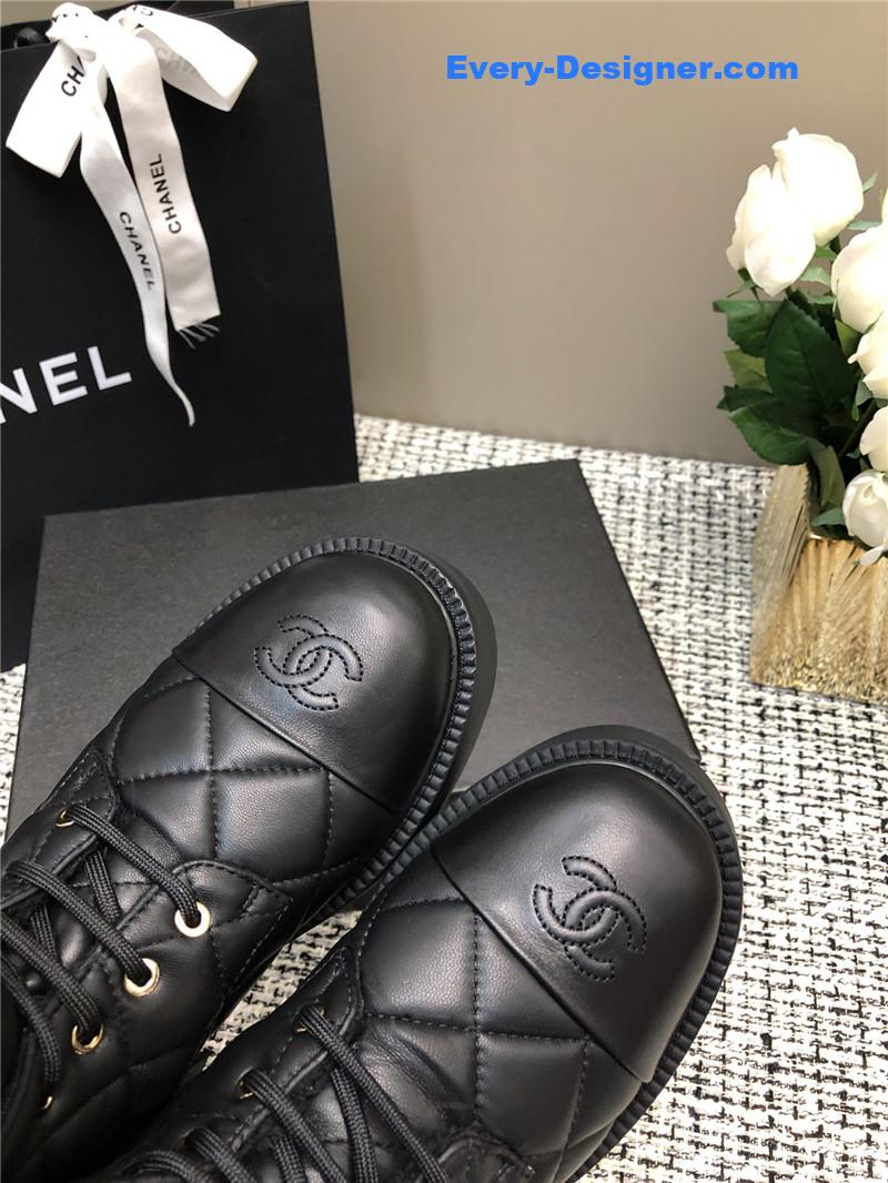Ch**el quilted black leather snow boots