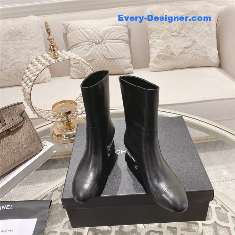 Ch**el black round toe calfskin ankle boots