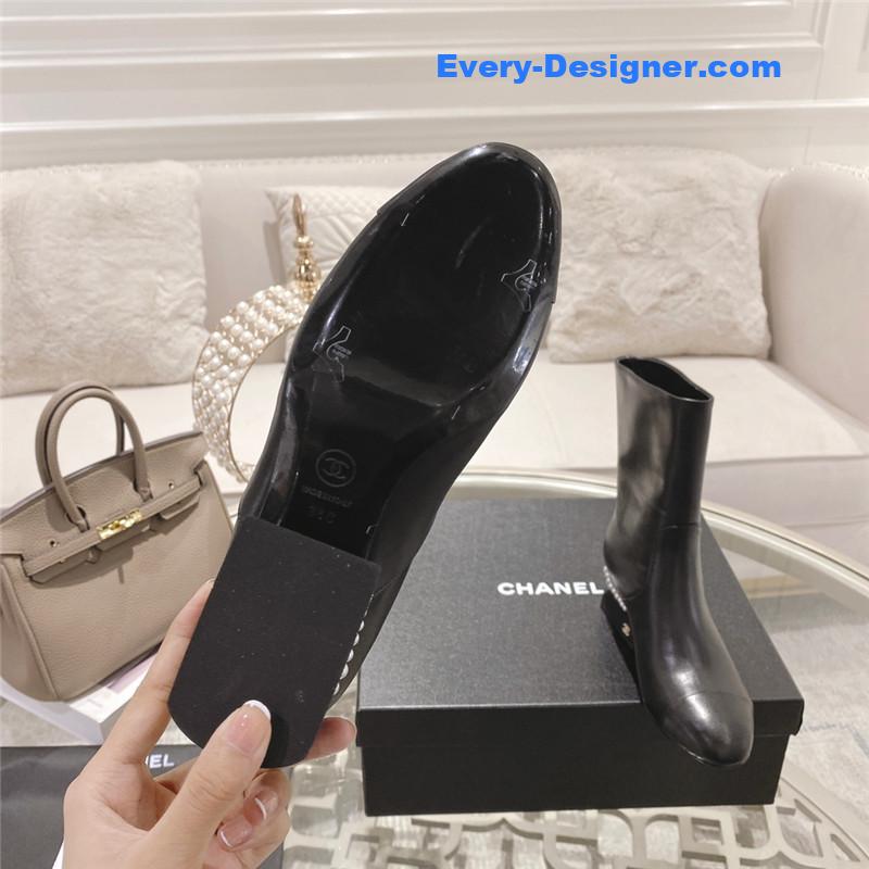 Ch**el black round toe calfskin ankle boots