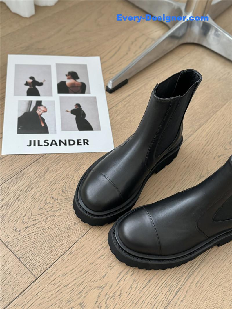 Ch**el black leather calfskin cap toe ankle boots