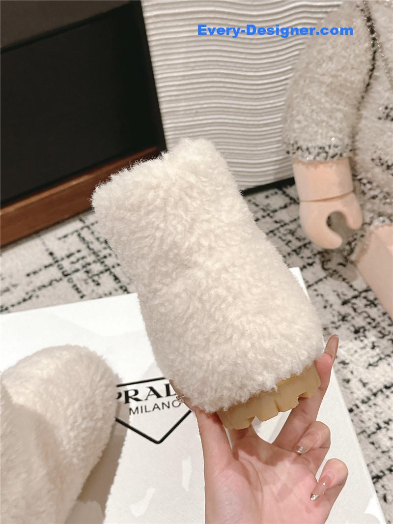 Pra*a white shearling booties