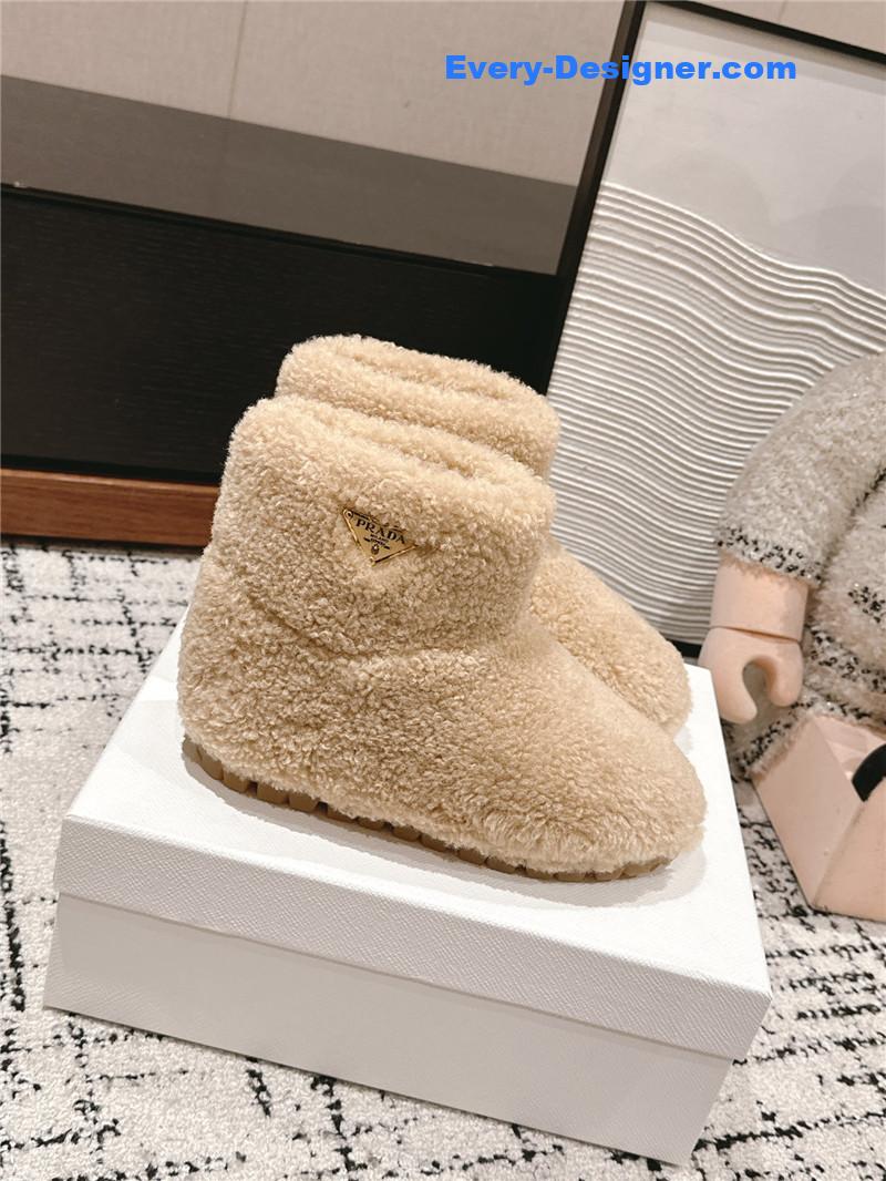 Pra*a shearling booties beige