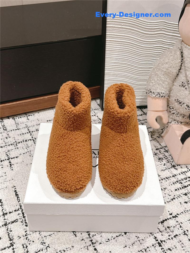 Pra*a shearling booties in brown