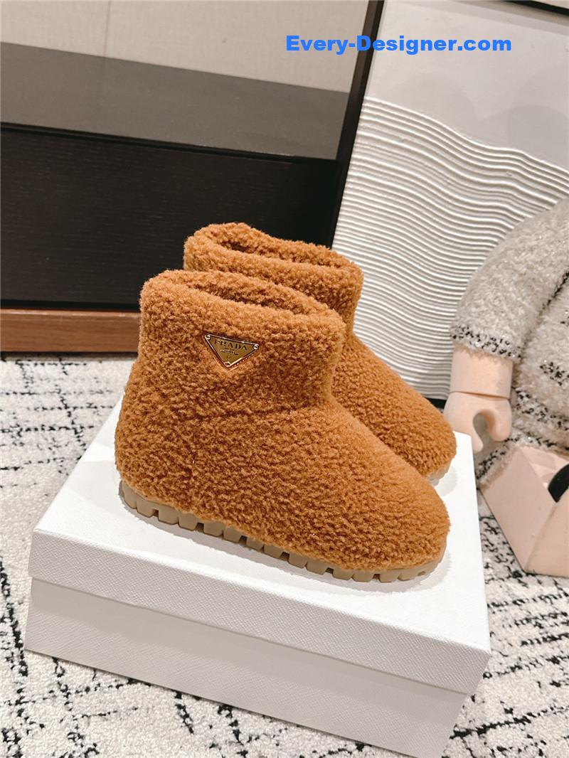 Pra*a shearling booties in brown