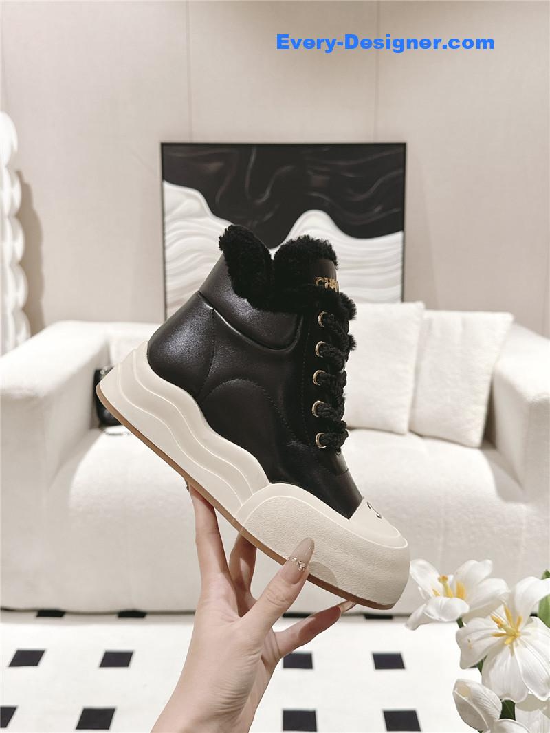 Ch**el black wool ankle boots