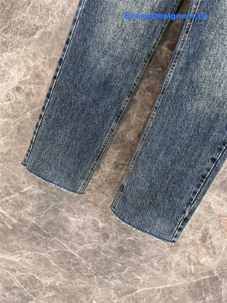 M1um1u embroidered raw-edge jeans