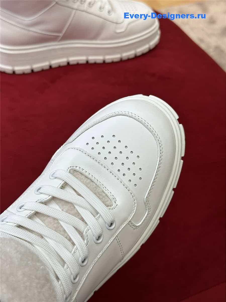 Pra*a white triangle-logo high-top leather sneakers