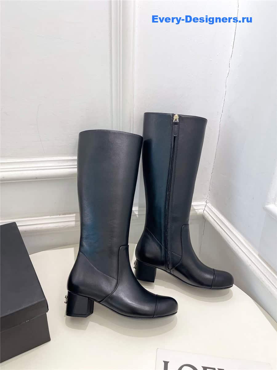 Ch**el black leather heeled boots