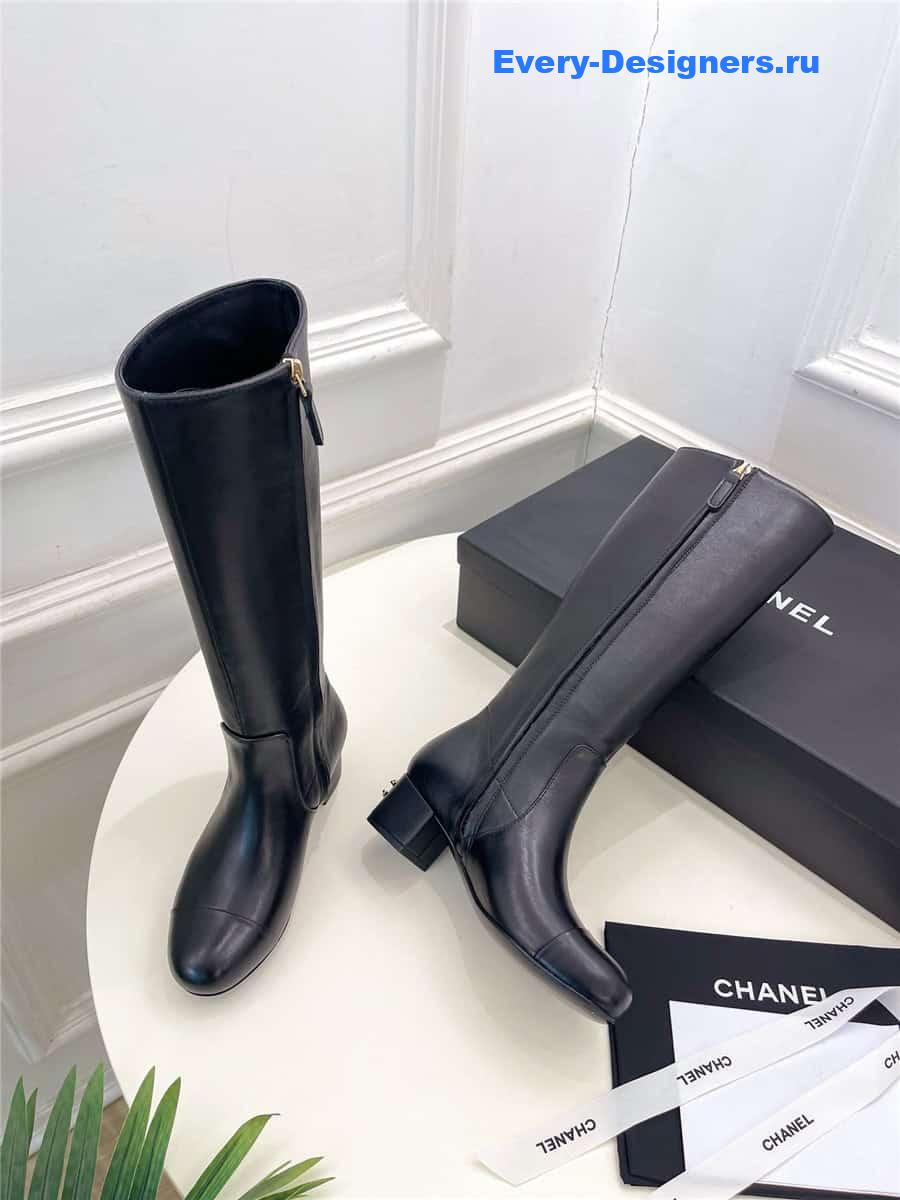 Ch**el black leather heeled boots