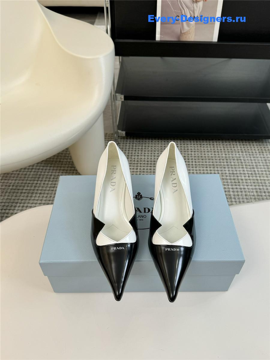 Pra*a smooth leather pumps black/white