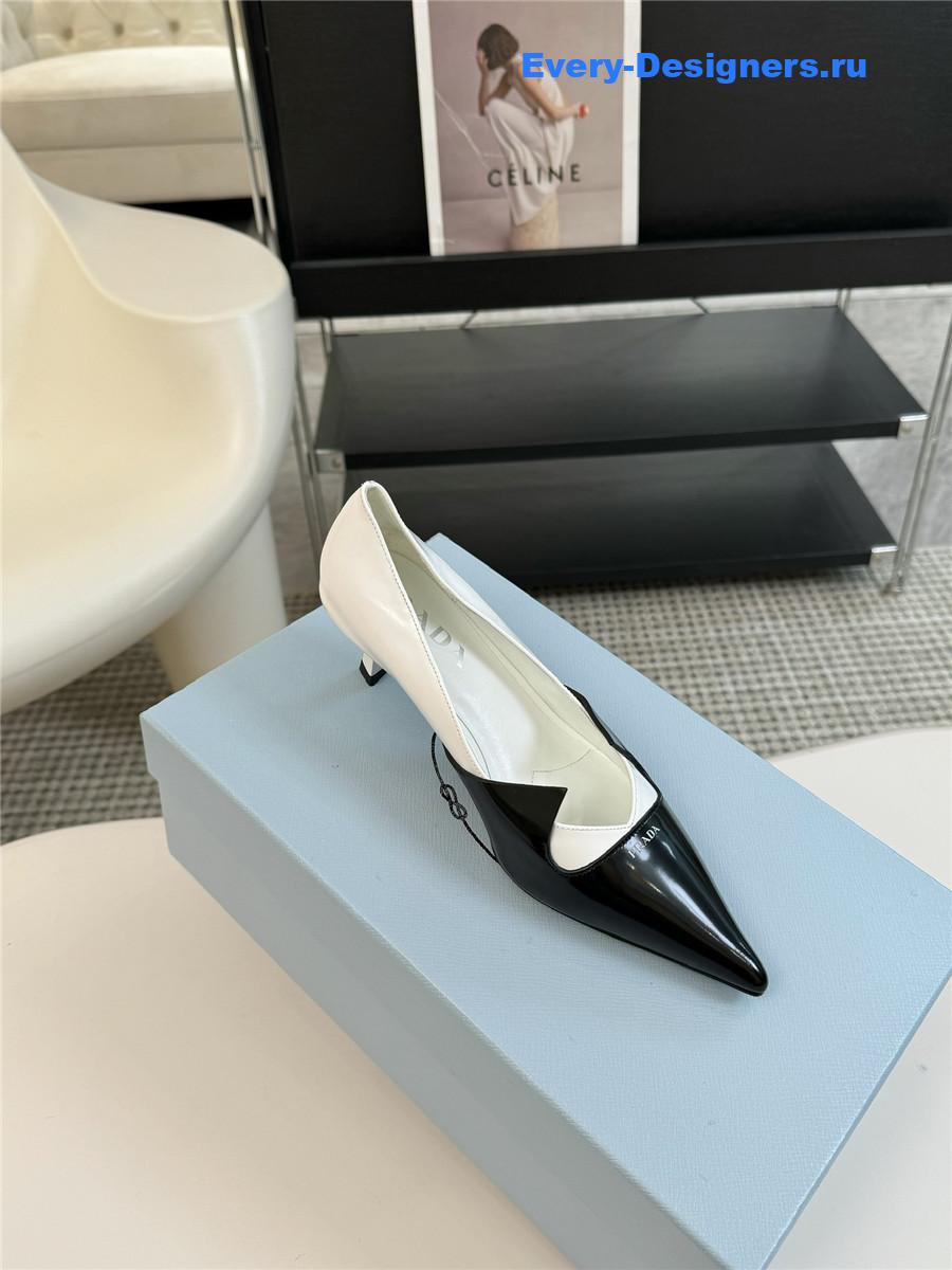 Pra*a smooth leather pumps black/white