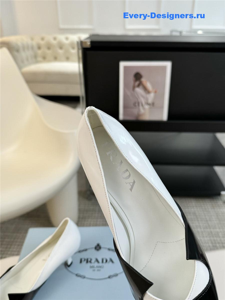 Pra*a smooth leather pumps black/white