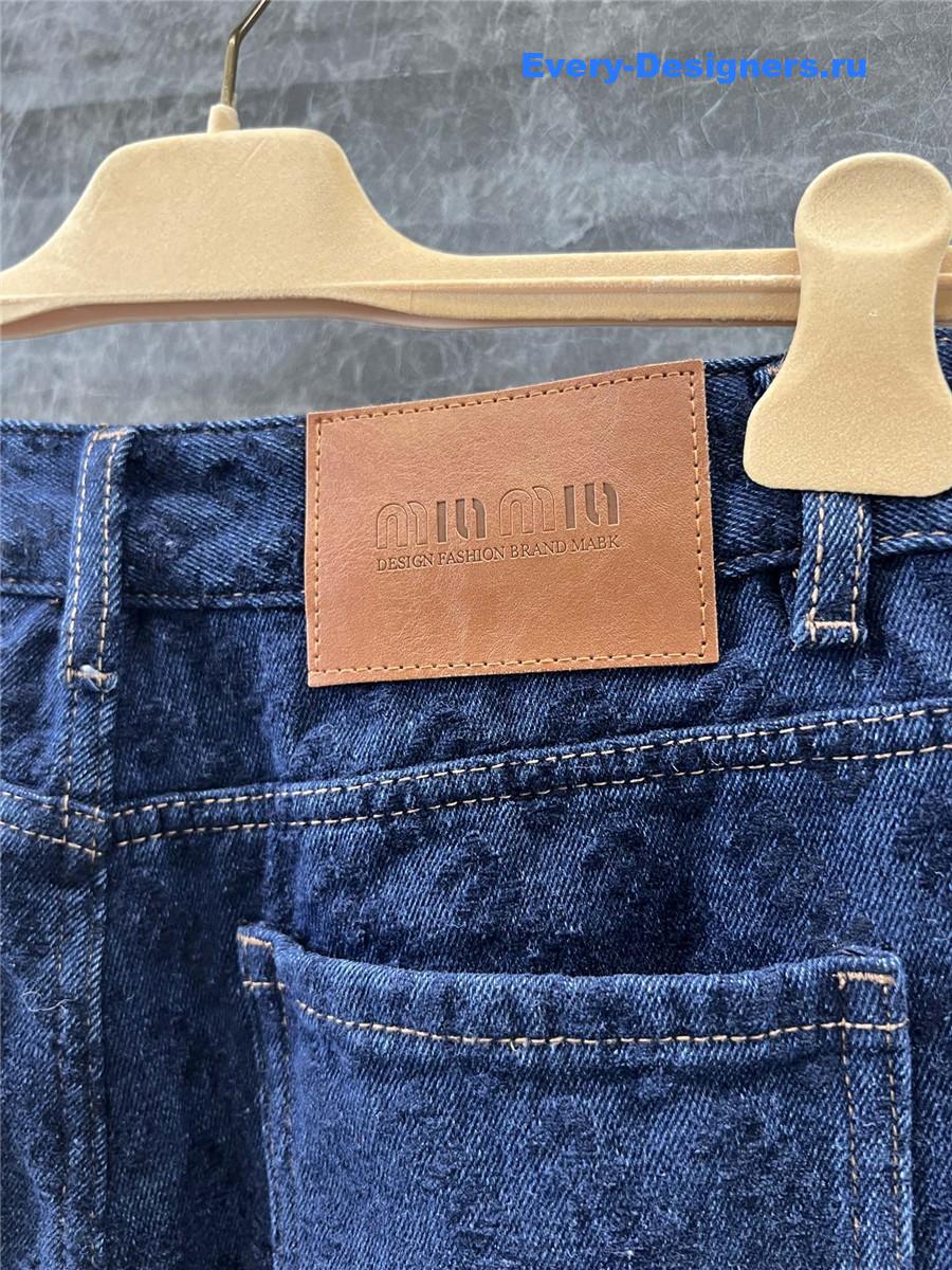 M1um1u letter flocked denim wide-leg pants