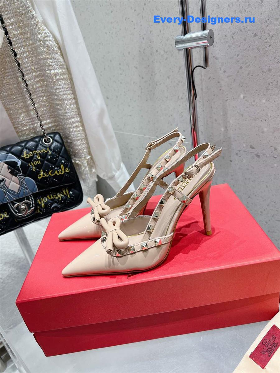 Va1e*ntin0 rockstud bow patent leather pink slingback pump