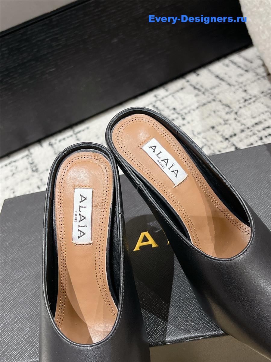 Alaia Black Spike Mules in Calfskin