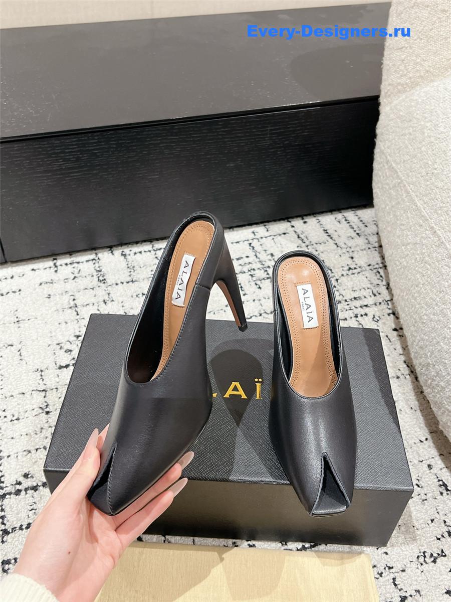 Alaia Black Spike Mules in Calfskin