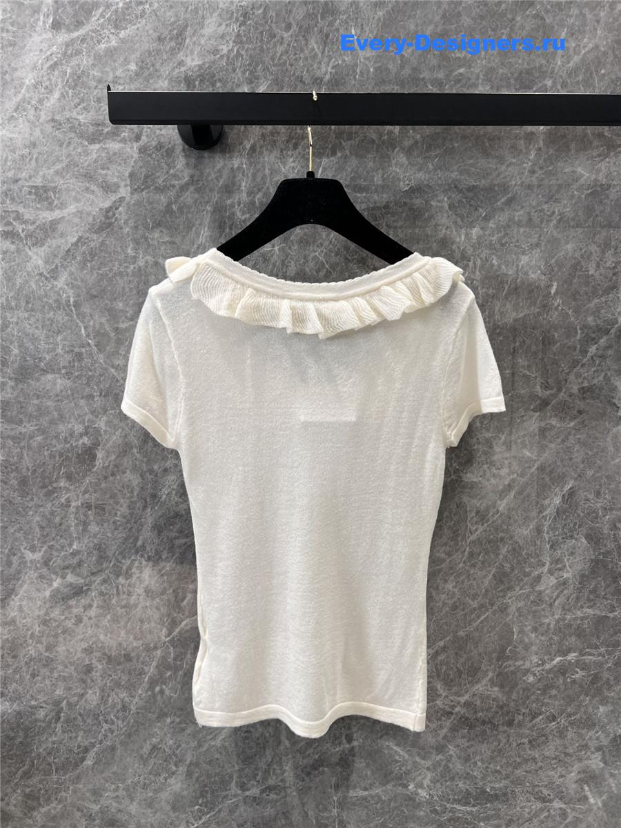 Ch**el beige crew neck knit top