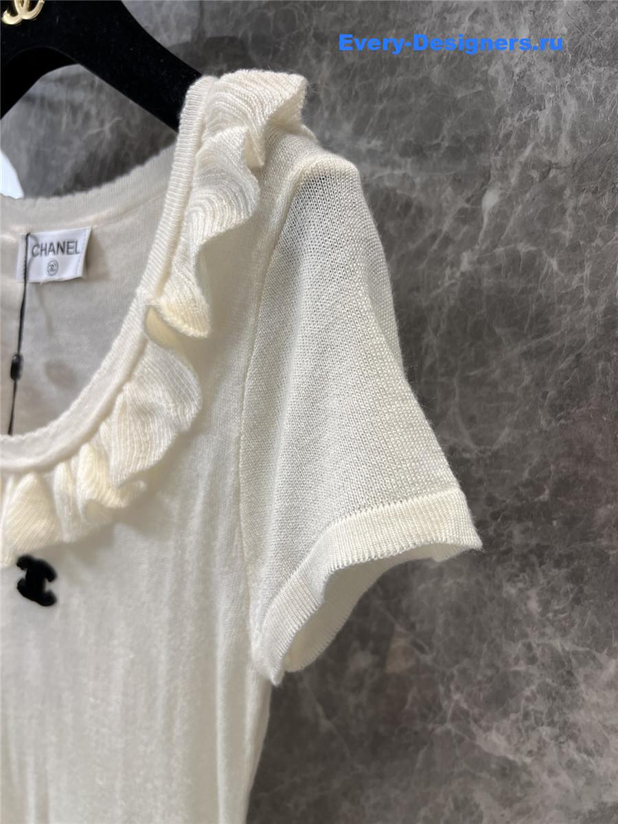 Ch**el beige crew neck knit top
