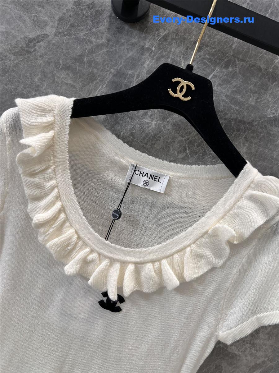 Ch**el beige crew neck knit top
