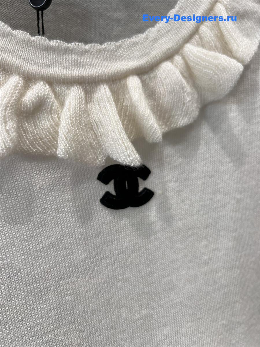 Ch**el beige crew neck knit top