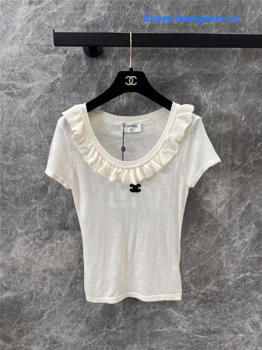 Ch**el beige crew neck knit top