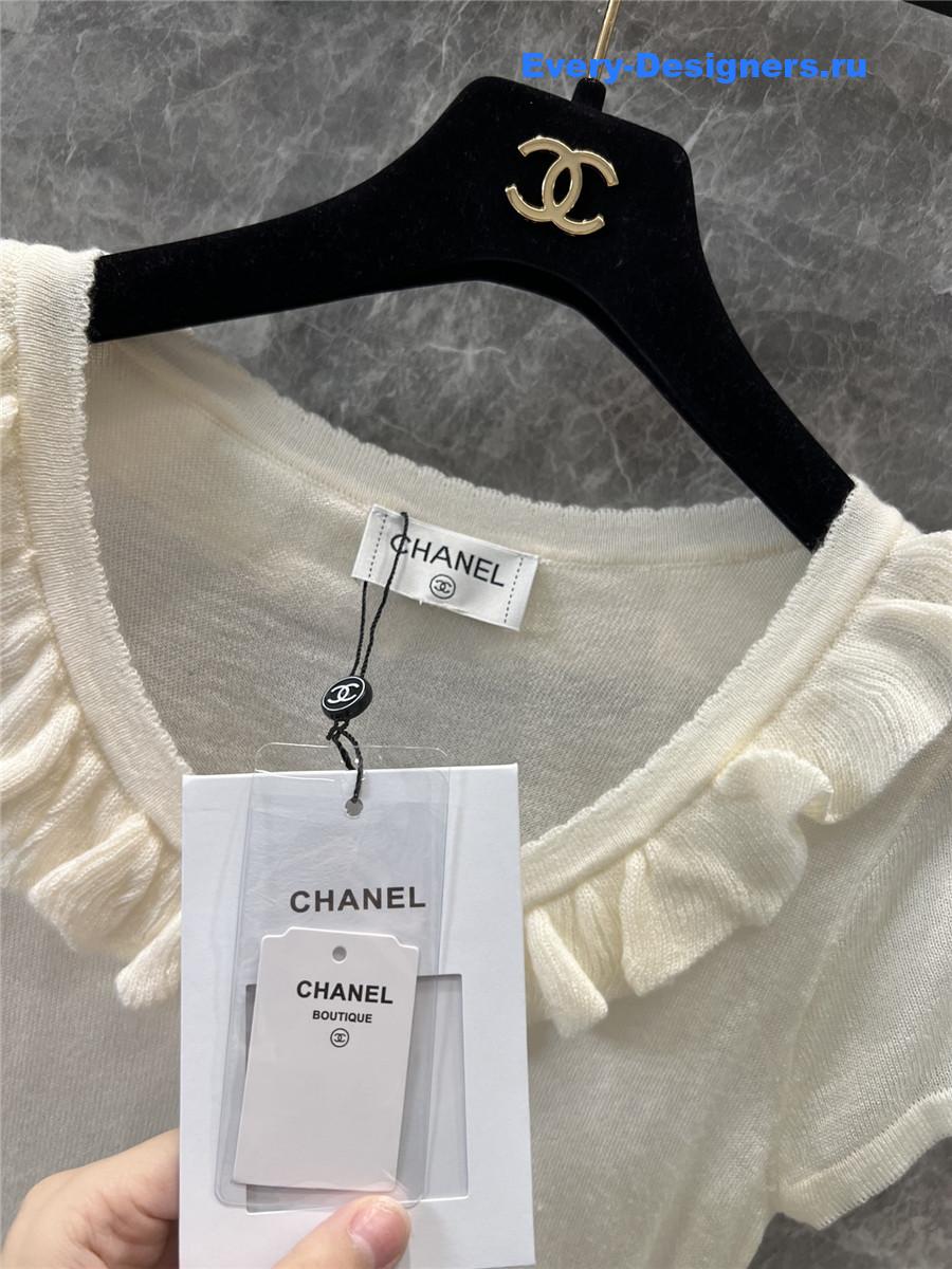 Ch**el beige crew neck knit top