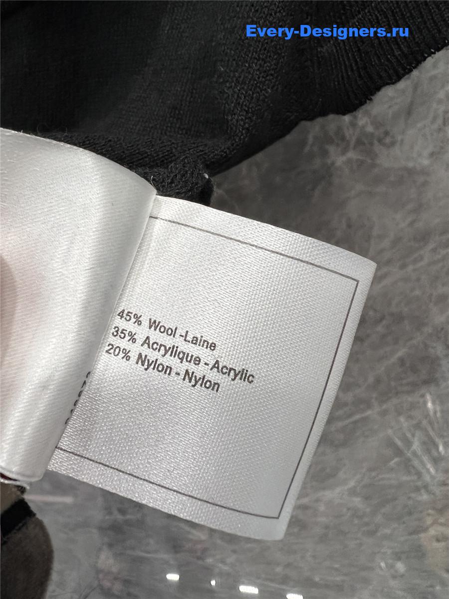 Ch**el black crew neck knit top