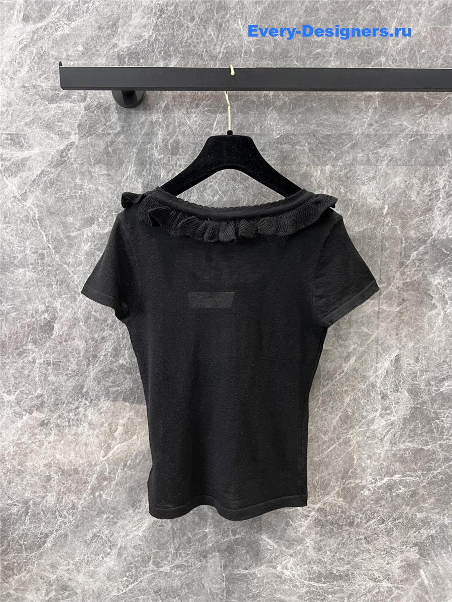 Ch**el black crew neck knit top