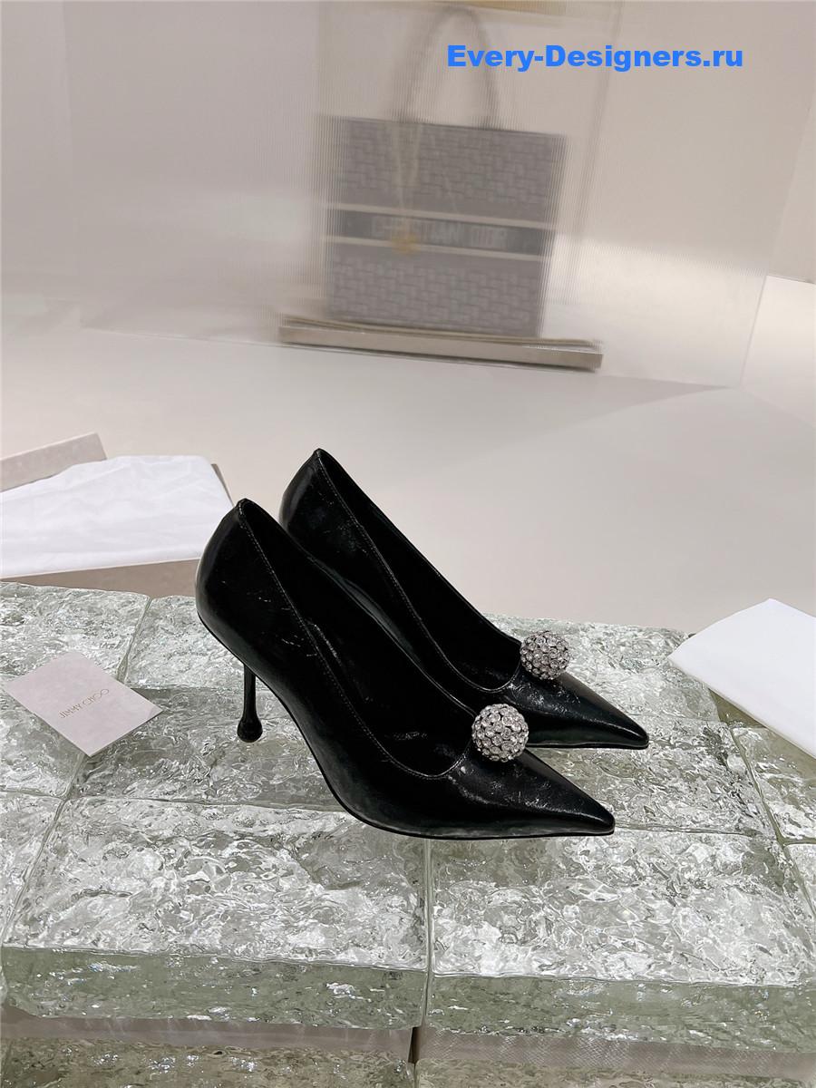 J1m*y Ch00 orb 95 embellished patent leather pumps in black