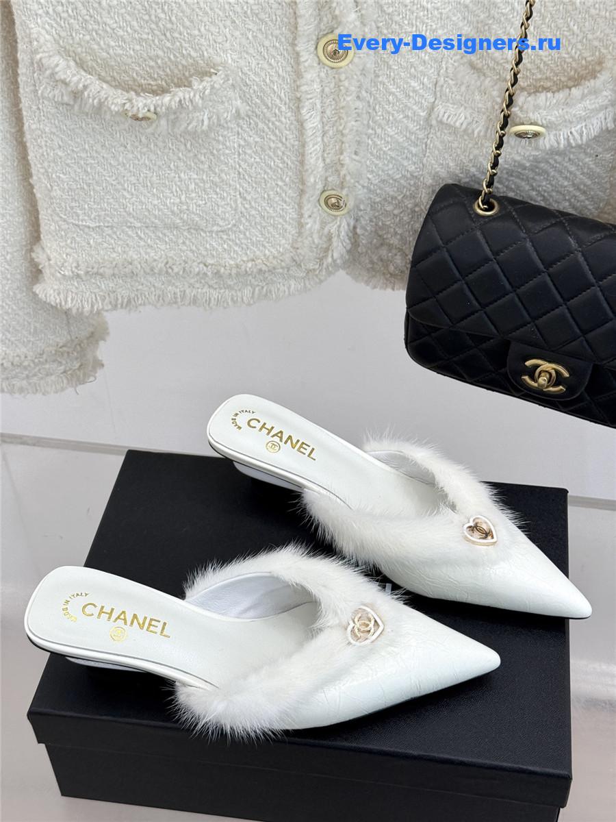 Ch**el rabbit fur pointed toe mules white