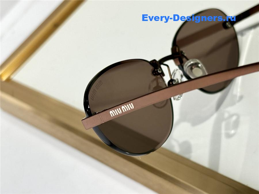 Miu Miu SMU A59 Rimless Sunglasses