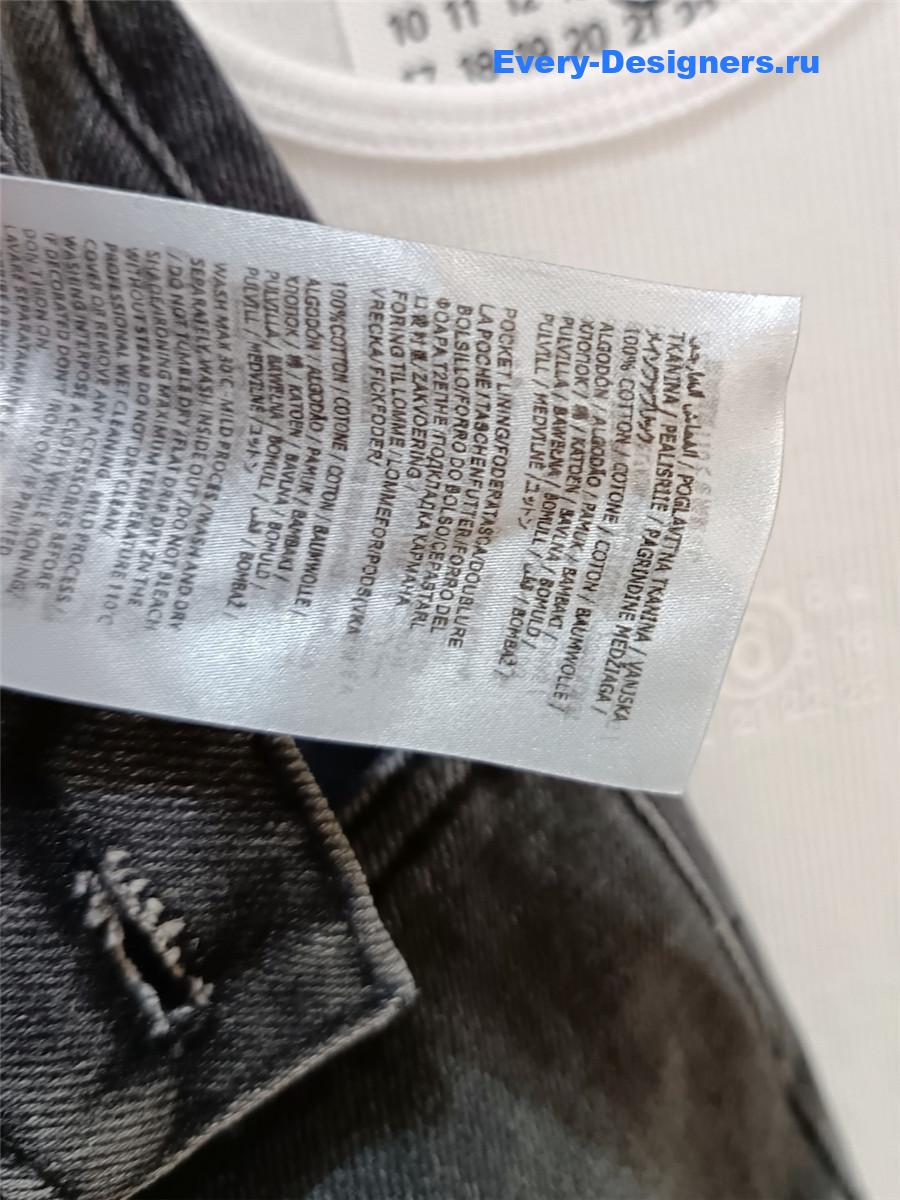 Ce1i*e cutout high-rise tapered jeans