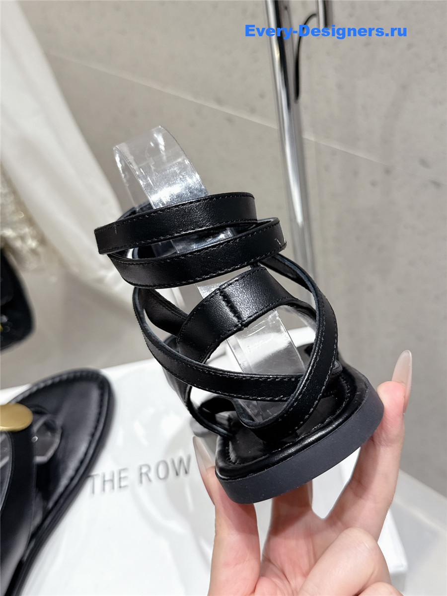 The R0w black strap flip flop flat sandals