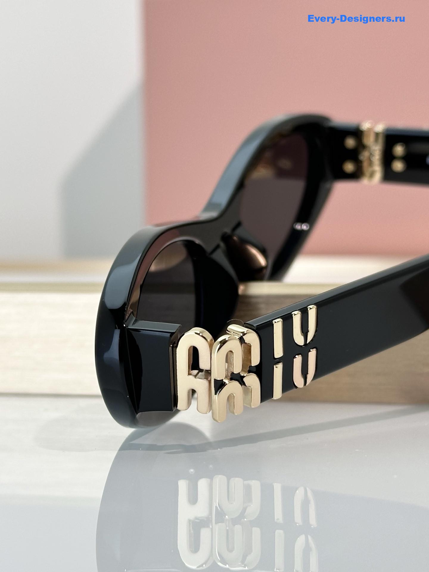 Miu Miu Black Cat-Eye Sunglasses