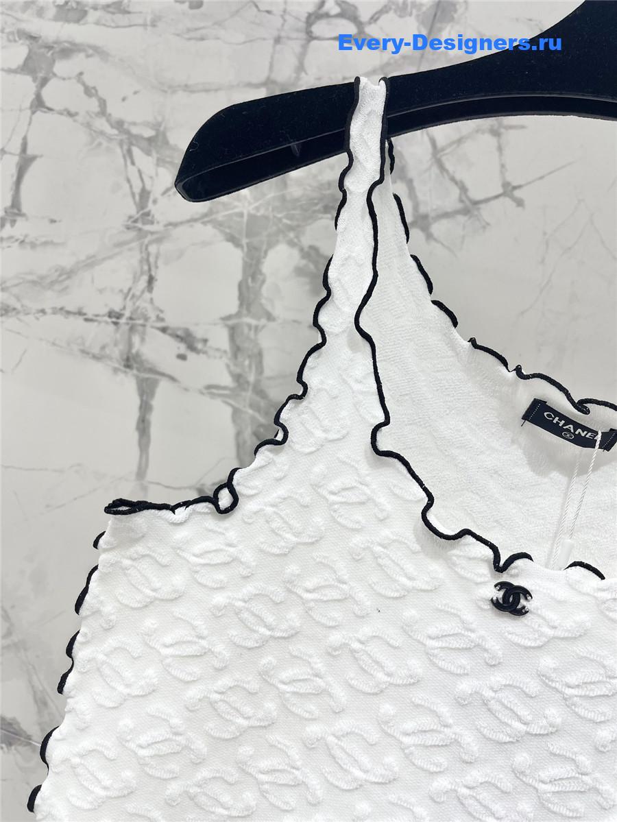 Ch**el embroidered wool-silk top in white