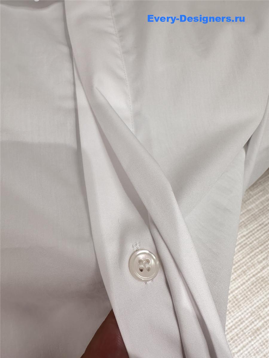 Sa1nt Lau*nt white bow blouse