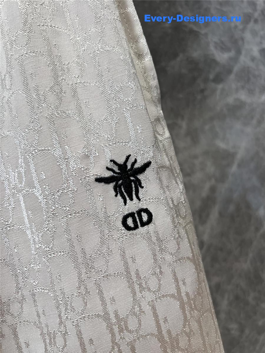 D10r bee embroidered trousers in beige