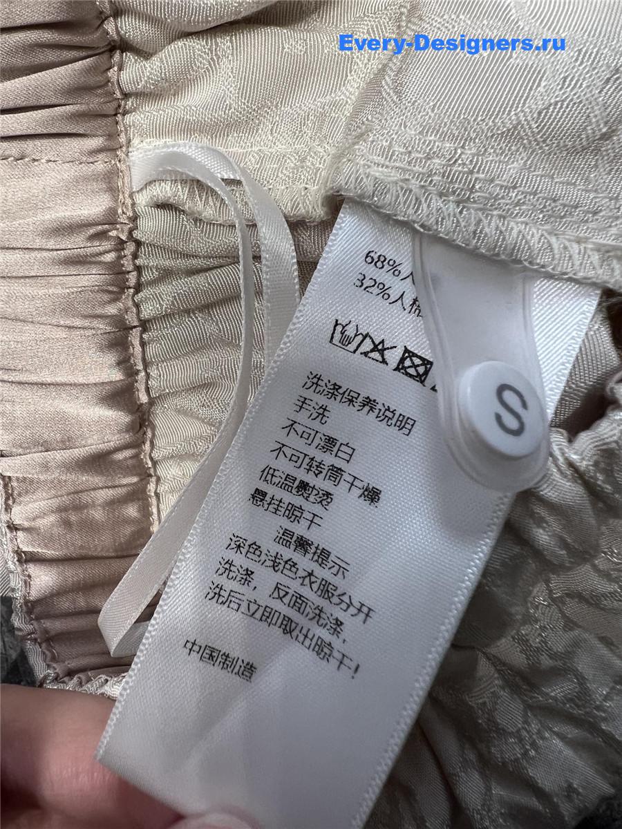 D10r bee embroidered trousers in beige