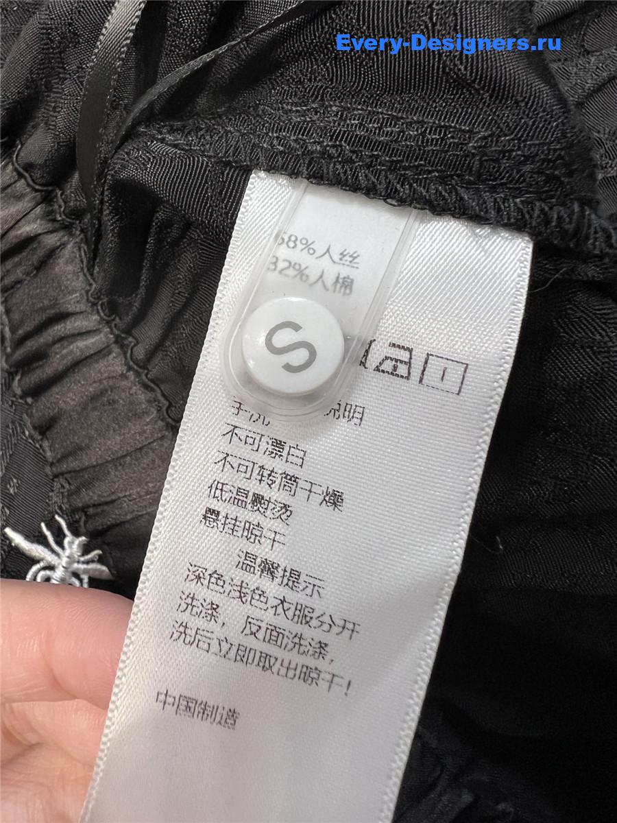 D10r bee embroidered black trousers