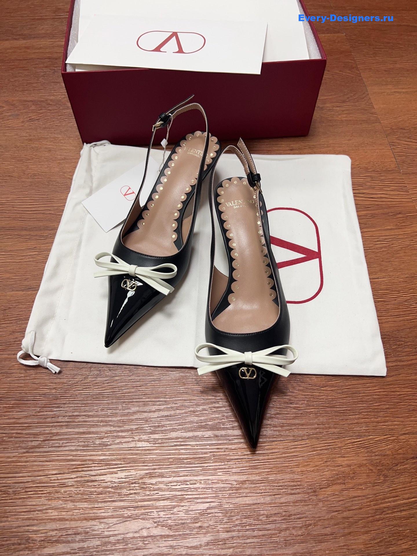 Va1e*ntin0 garavani bow slingback pumps in black