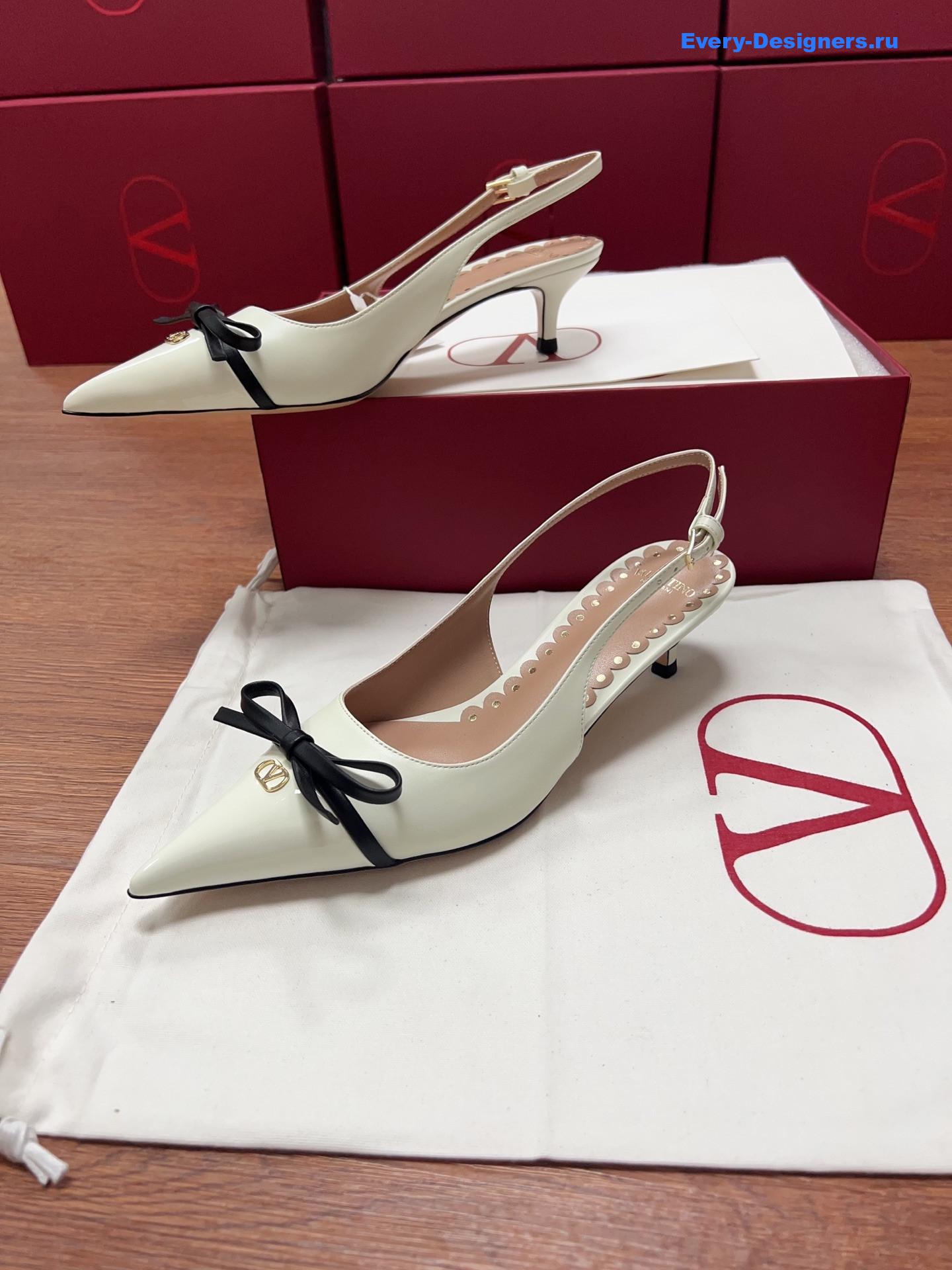 Va1e*ntin0 garavani white bow slingback pumps