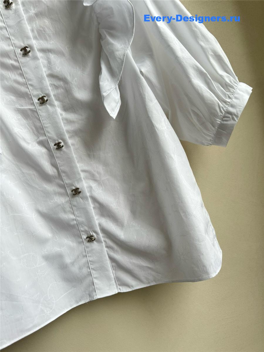 Ch**el white ruffle sleeve shirt