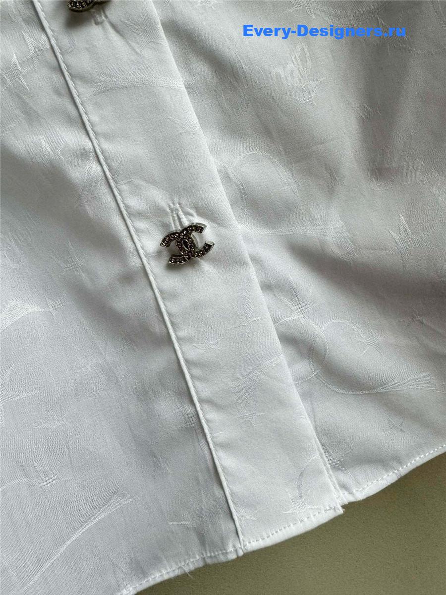 Ch**el white ruffle sleeve shirt