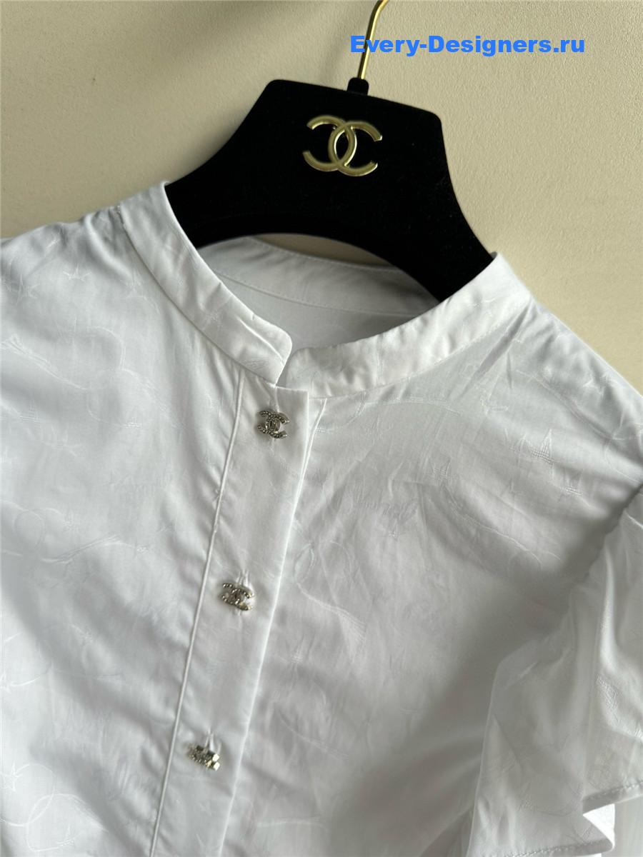 Ch**el white ruffle sleeve shirt