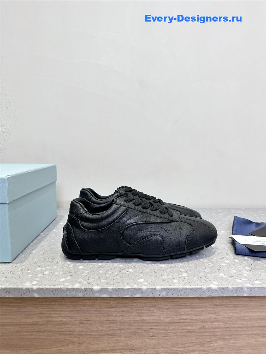 Pra*a black leather low-top sneakers