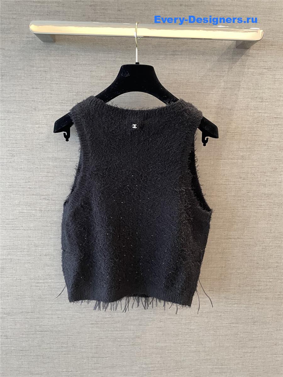 Ch**el feather rhinestone vest