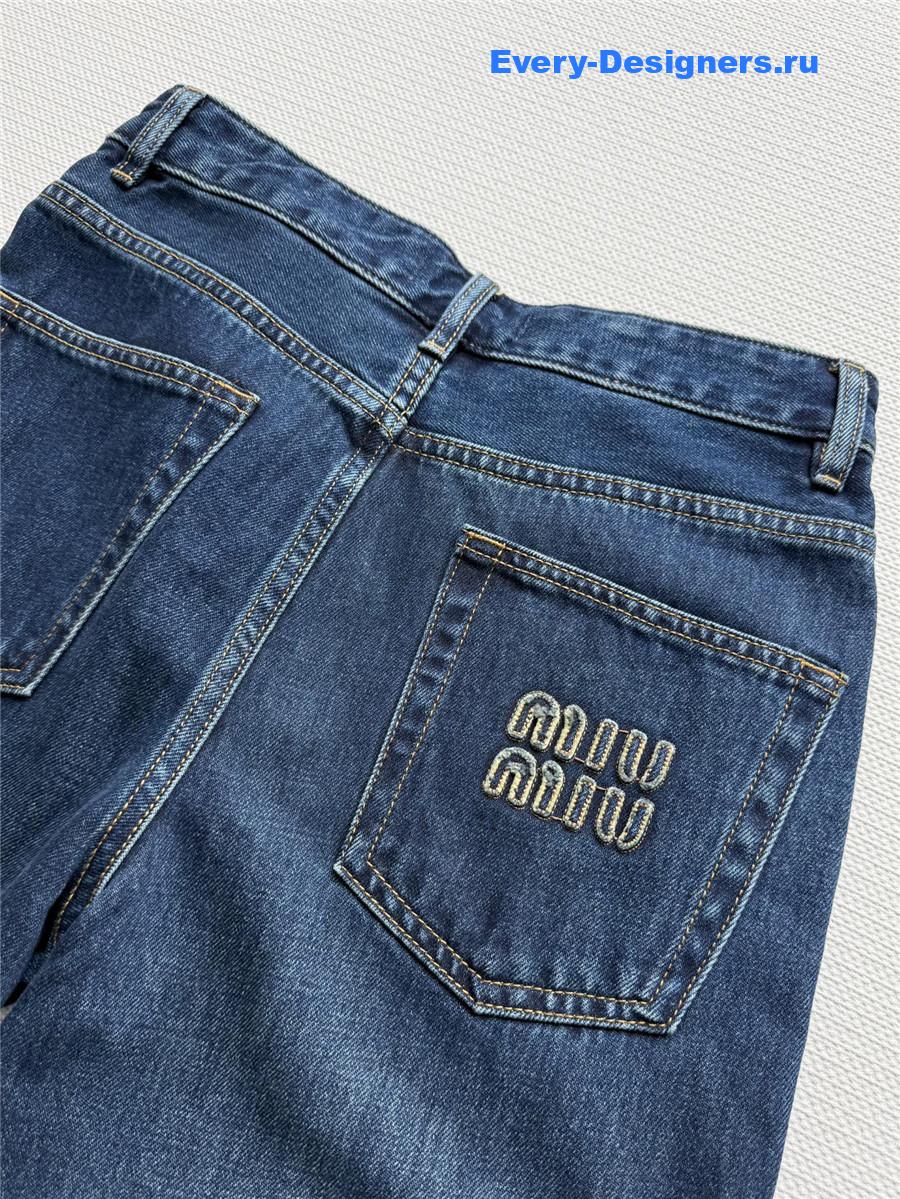 Miu Miu Washed Jeans with Embroidered Logo