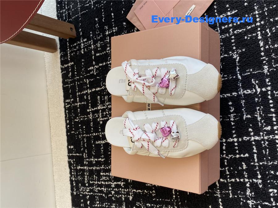 Miu Miu Plume Suede Mules Neutral